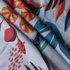 Close-up of colorful fabric with abstract leaf patterns