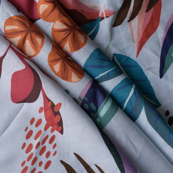 Close-up of colorful fabric with abstract leaf patterns
