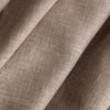 Close-up of Earthbound Chambray Linen fabric in a warm taupe stone shade, 100% linen, 145 GSM with chambray texture — close-up weave detail