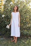 lady wearing white dress made using Fawn Dress Set Sewing Pattern - Versatile Dresses with Pockets in Two Bodice Styles