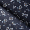 Dark navy 100% linen fabric with white daisy floral pattern, light-blue and ochre details, suitable for summer clothing