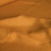 Saturated golden ochre 100% linen fabric with a luxurious smooth finish