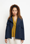 Grainline Studio Cortland Trench sewing pattern with modern swing shape, storm flaps, and bound seams for durability