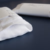 Handmade White Linen Eye Pillow made in Australia, filled with Organic Australian Golden Linseed and optional Organic Lavender Flowers. Includes a removable and washable 100% linen cover, ideal for yoga, meditation, and stress relief. Size: 22cm x 10cm, weight: 210-220g.