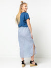 Indigo Maxi Skirt sewing pattern, featuring an elastic waist, faux button opening, patch pockets, and side splits, ideal for cotton, linen, crepe, or rayon fabrics.