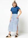 Indigo Maxi Skirt sewing pattern, featuring an elastic waist, faux button opening, patch pockets, and side splits, ideal for cotton, linen, crepe, or rayon fabrics.