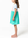 Lacey Kids Dress sewing pattern, featuring an easy slip-on design with extended shoulders, square line bodice, and slightly gathered skirt, suitable for knit or woven fabrics.