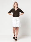 Lennox Woven Skirt made using the sewing pattern, "A" line panelled design, button-through front, patch pockets with flaps, shown in linen fabric.