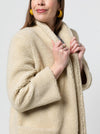 Loren Jacket sewing pattern, featuring an essential three-quarter length design with a slim shawl collar and optional pockets, suitable for wool, linen, ponte, crepe, faux fur, sweater knit, or lurex fabrics.