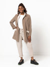 Loren Jacket sewing pattern, featuring an essential three-quarter length design with a slim shawl collar and optional pockets, suitable for wool, linen, ponte, crepe, faux fur, sweater knit, or lurex fabrics.