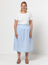 A chic Memphis gathered skirt sewing pattern with a fitted waistband and panelled hem seam, designed for medium weight woven fabrics.