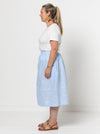 A chic Memphis gathered skirt sewing pattern with a fitted waistband and panelled hem seam, designed for medium weight woven fabrics.