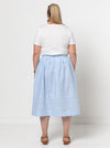 A chic Memphis gathered skirt sewing pattern with a fitted waistband and panelled hem seam, designed for medium weight woven fabrics.