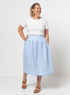 A chic Memphis gathered skirt sewing pattern with a fitted waistband and panelled hem seam, designed for medium weight woven fabrics.