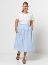 A chic Memphis gathered skirt sewing pattern with a fitted waistband and panelled hem seam, designed for medium weight woven fabrics.