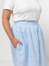 A chic Memphis gathered skirt sewing pattern with a fitted waistband and panelled hem seam, designed for medium weight woven fabrics.