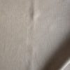 Close-up of Natural Crest Stripe — natural beige 100% linen fabric with vertical herringbone stripes, 220 GSM