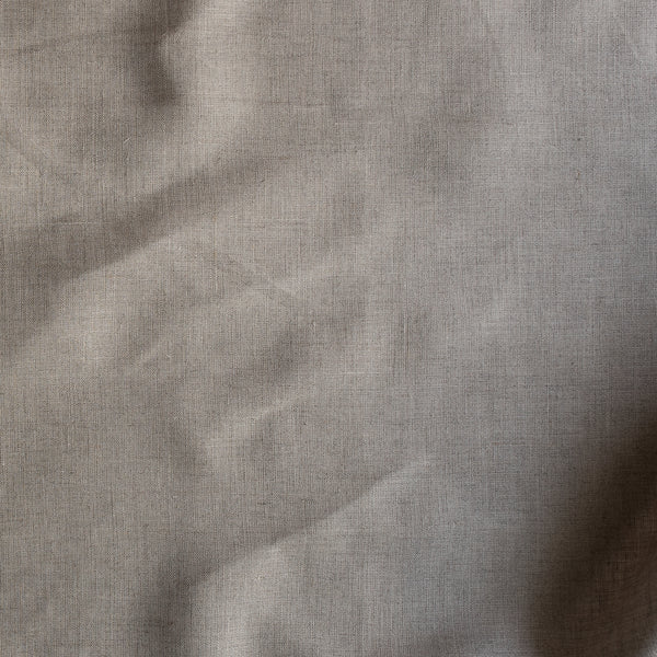 Close-up of Natural Flax soft beige 100% linen fabric, 140 GSM, 60 LEA – close-up texture