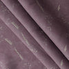 Purple Wattle linen fabric with white leaf silhouettes and brushstroke patterns on a deep purple 