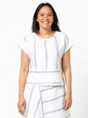 Quinn Woven Top sewing pattern with square cut, extended shoulder line, boxy shape, and front and back panelling.