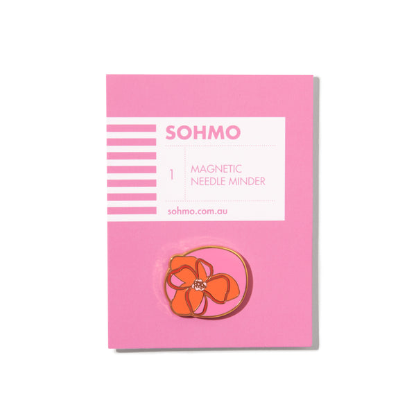 Pink packaging of SOHMO magnetic needle minder on a white background