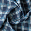 Sydney Plaid linen fabric with navy blue, lighter blue, and white plaid pattern