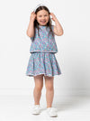 Style Arc’s Victoria Kids Dress pattern with bodice overlay and elastic waist, perfect for summer fabrics.