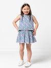 Style Arc’s Victoria Kids Dress pattern with bodice overlay and elastic waist, perfect for summer fabrics.