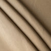 Close-up of Wheatfield Tan is a warm golden 100% linen fabric with folds