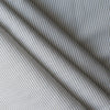 Close-up of Whisper Moss Stripe linen–organic cotton fabric with thin eucalyptus green stripes on white, 140 GSM.