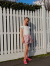 Alice Kids Short sewing pattern with options for a front overlay and frill, showcasing the design’s versatility and charm for children’s clothing.