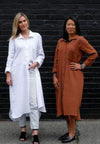 Anais Woven Dress sewing pattern, highlighting its long line shirt dress design with long sleeves, shirt tails, collar, and pockets for a refined and stylish garment