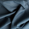 Elegant Business Blue Linen-Cotton Blend Fabric with a touch of spandex, offering a soft feel and wrinkle resistance for timeless fashion pieces.