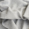 Sophisticated Chrome Grey Linen Fabric with a fine linen texture and a blend of white warp and grey weft, ideal for creating elegant and timeless clothing.