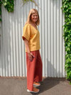 Contemporary Darby Woven Pant pattern with a wide leg, elastic waist, and convenient patch pockets, designed for a fashionable and easy fit.