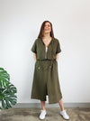 Stylish Eadie Woven Jumpsuit/Dress and Norman Jumpsuit pattern with extended shoulder line, wide legs, and front split skirt, offering a contemporary look.