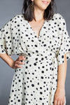 Charming Elodie Wrap Dress pattern with release pleats, dolman sleeves, and a choice of skirt lengths, perfect for any occasion from picnics to weddings