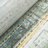 Lightweight linen-cotton blend fabric with scalloped, chevron, and striped patterns in green, yellow, maroon, and blue