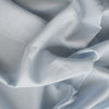 Very light washed blue linen fabric with a durable tight weave, ideal for summer garments