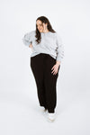 Stylish Pinnacle Curve Top/Sweater sewing pattern featuring a cropped oversized fit with two front triangle panels, available in variations with Deep V or Round necklines