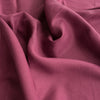 Lightweight Plain Plum 100% linen fabric with tight weave and fine texture, ideal for summer dresses, tops, skirts, and pants.