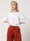 Style Arc’s Verona Woven Top pattern with raglan sleeves and gathered neck detail.